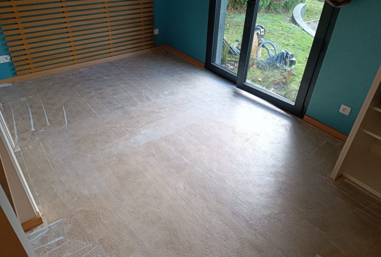 Pose de lames flotex dans hôtel Parqueteur Solier moquettiste